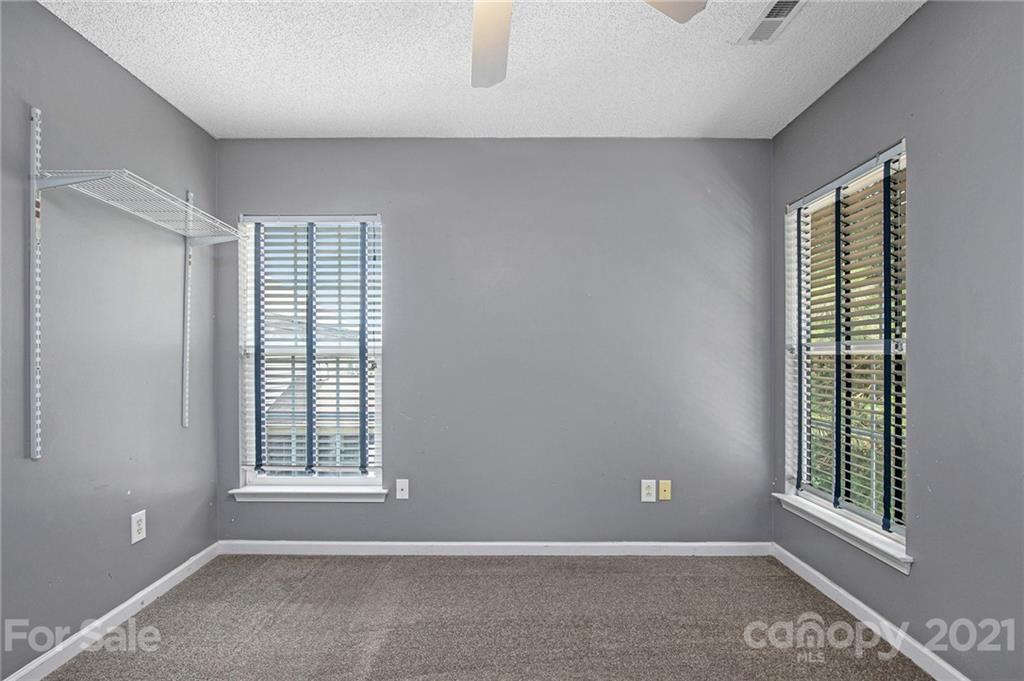 521 Red Oak Court Tega Cay, SC 29708 - Photo 20 of 23 an empty room with windows