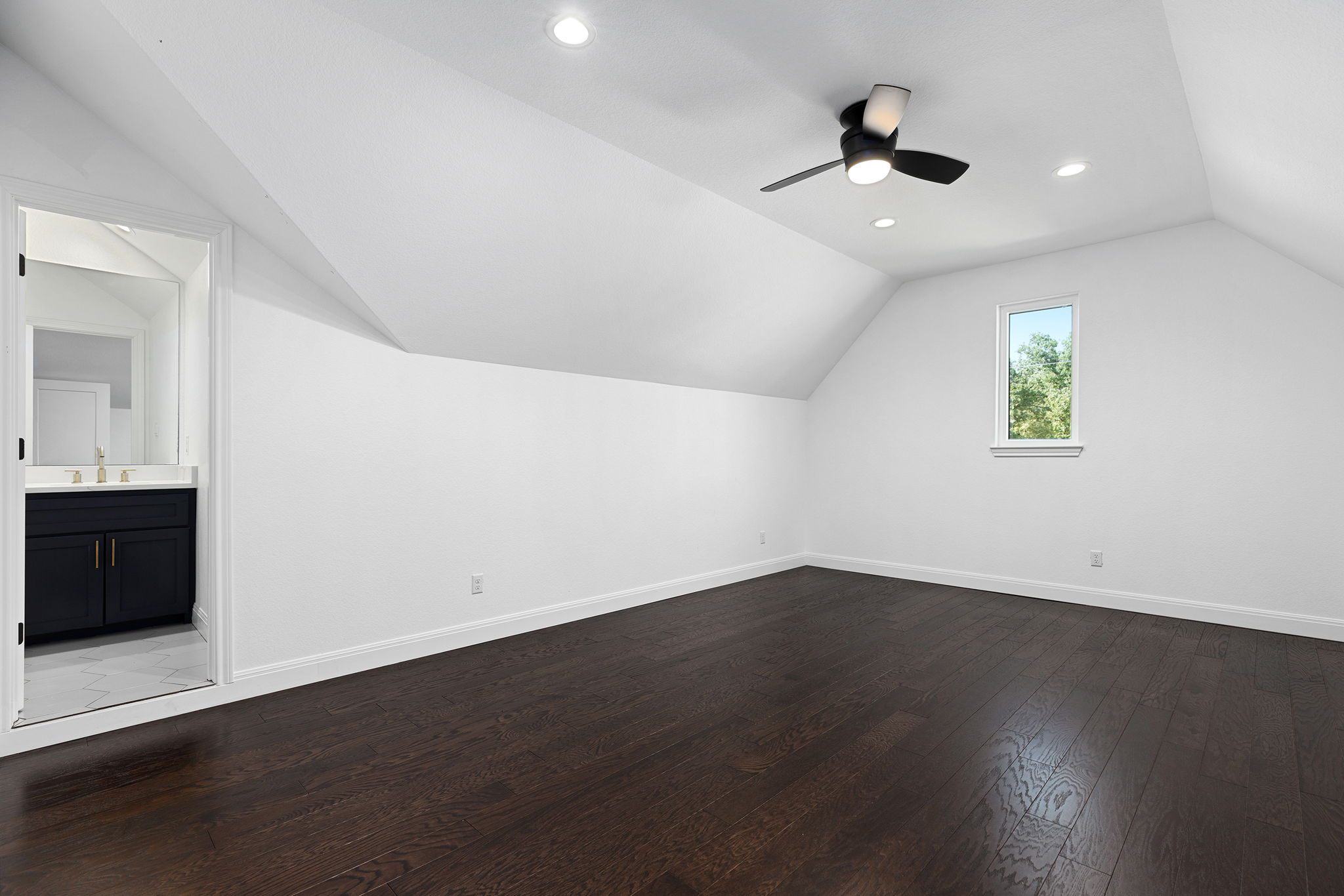 153 Fawn Hollow Elgin, TX 78621 - Photo 33 of 40 an empty room with wooden floor and windows