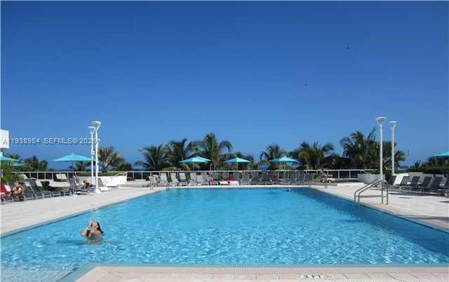 100 Lincoln Road, Unit 805 Miami Beach, FL 33139 - Photo 27 of 53 a view of swimming pool with outdoor seating