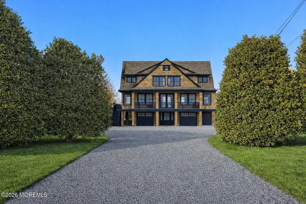 a black and white photo of a living room