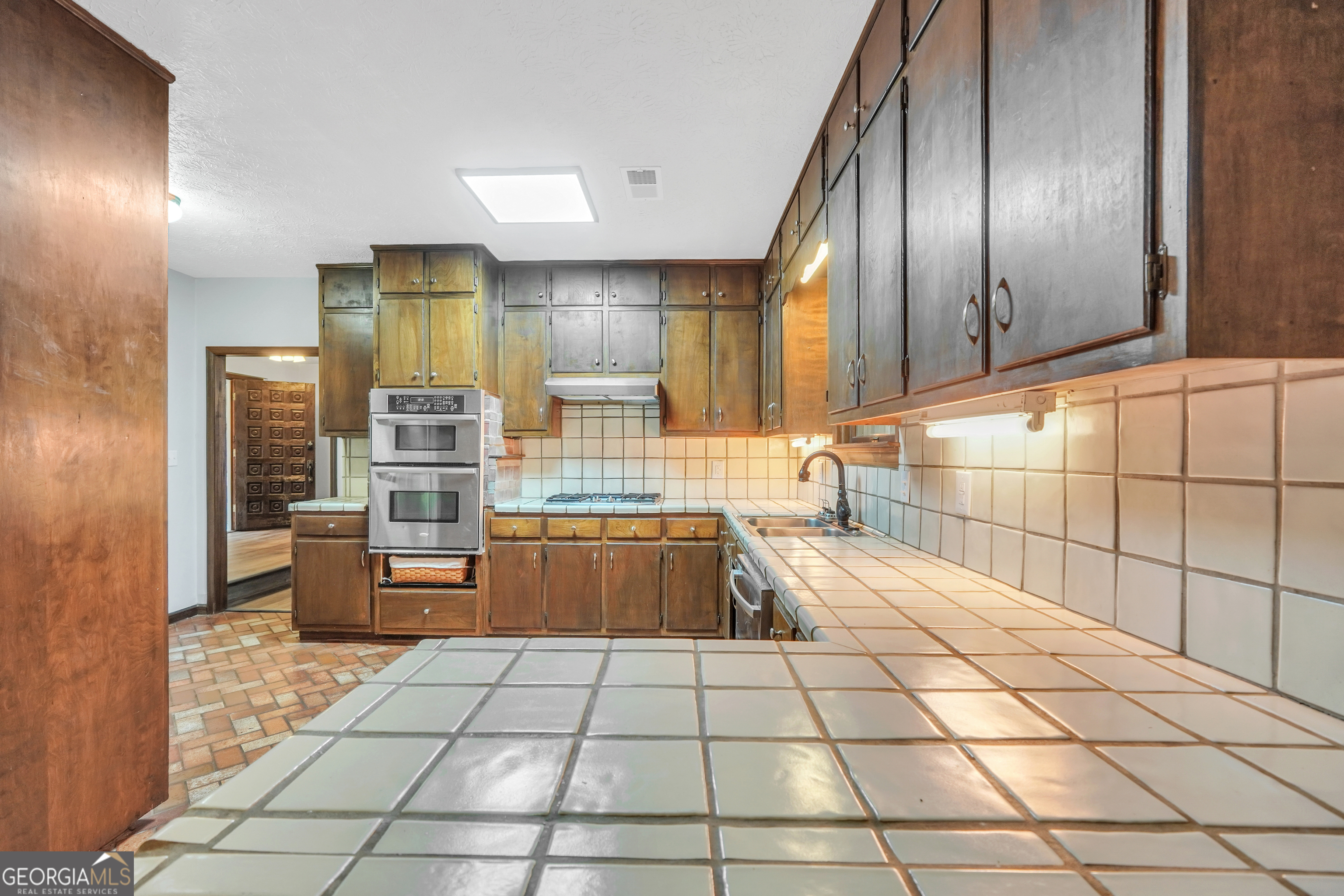 2103 Turner Church Road McDonough, GA 30252 - Photo 15 of 46 a kitchen with stainless steel appliances lots of counter top space