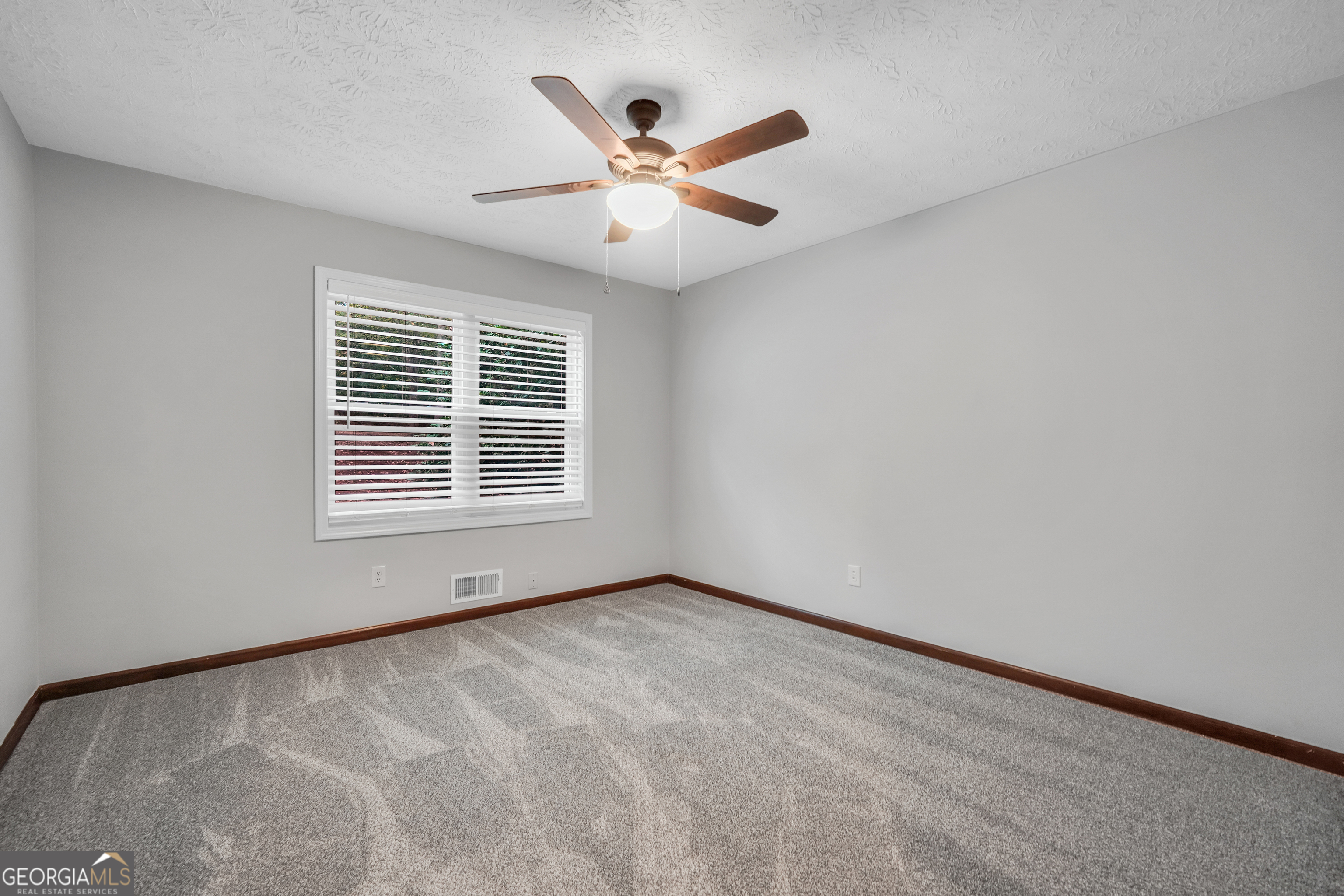 2103 Turner Church Road McDonough, GA 30252 - Photo 28 of 46 a view of an empty room with a window