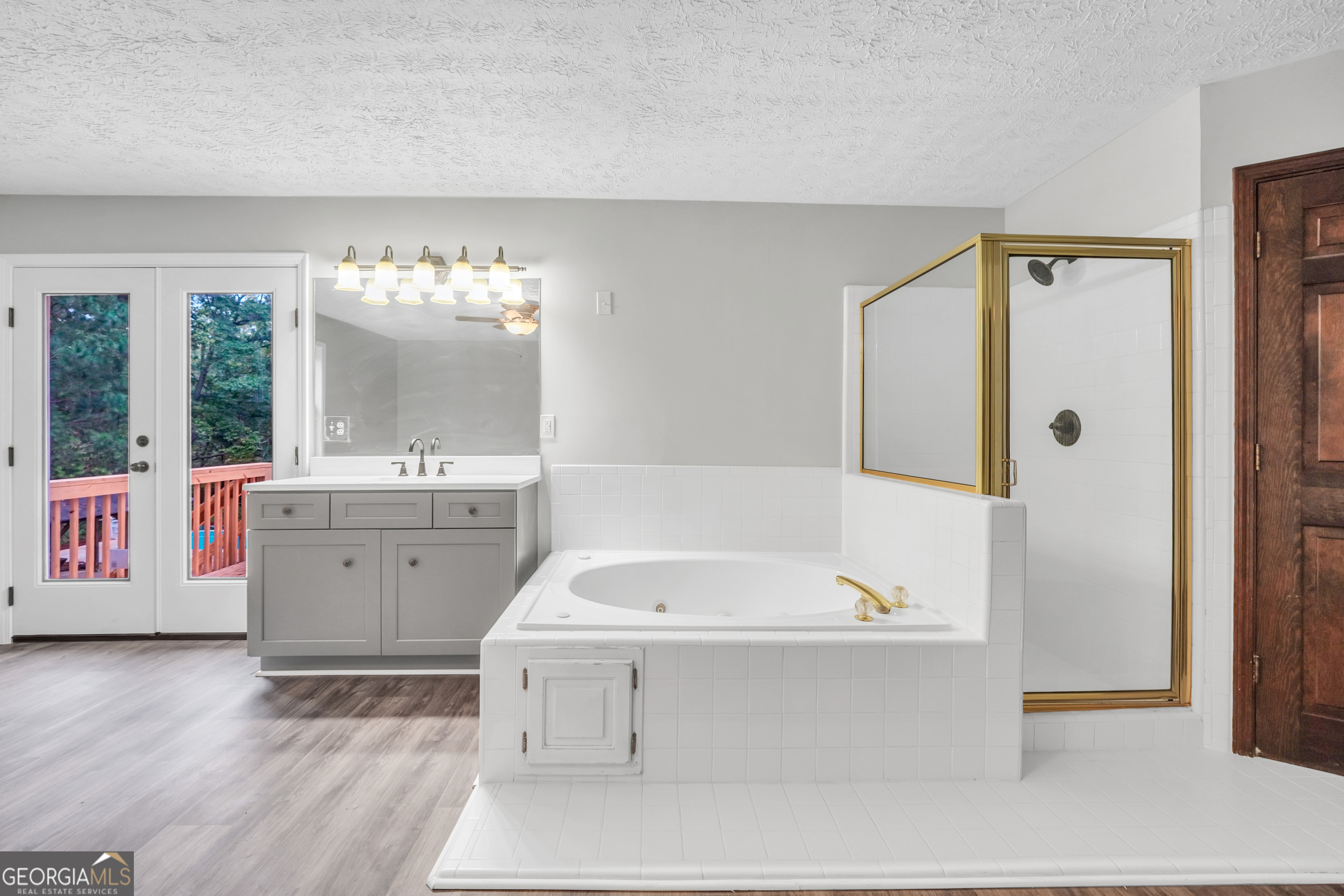 2103 Turner Church Road McDonough, GA 30252 - Photo 33 of 46 a bathroom with a tub sink and mirror