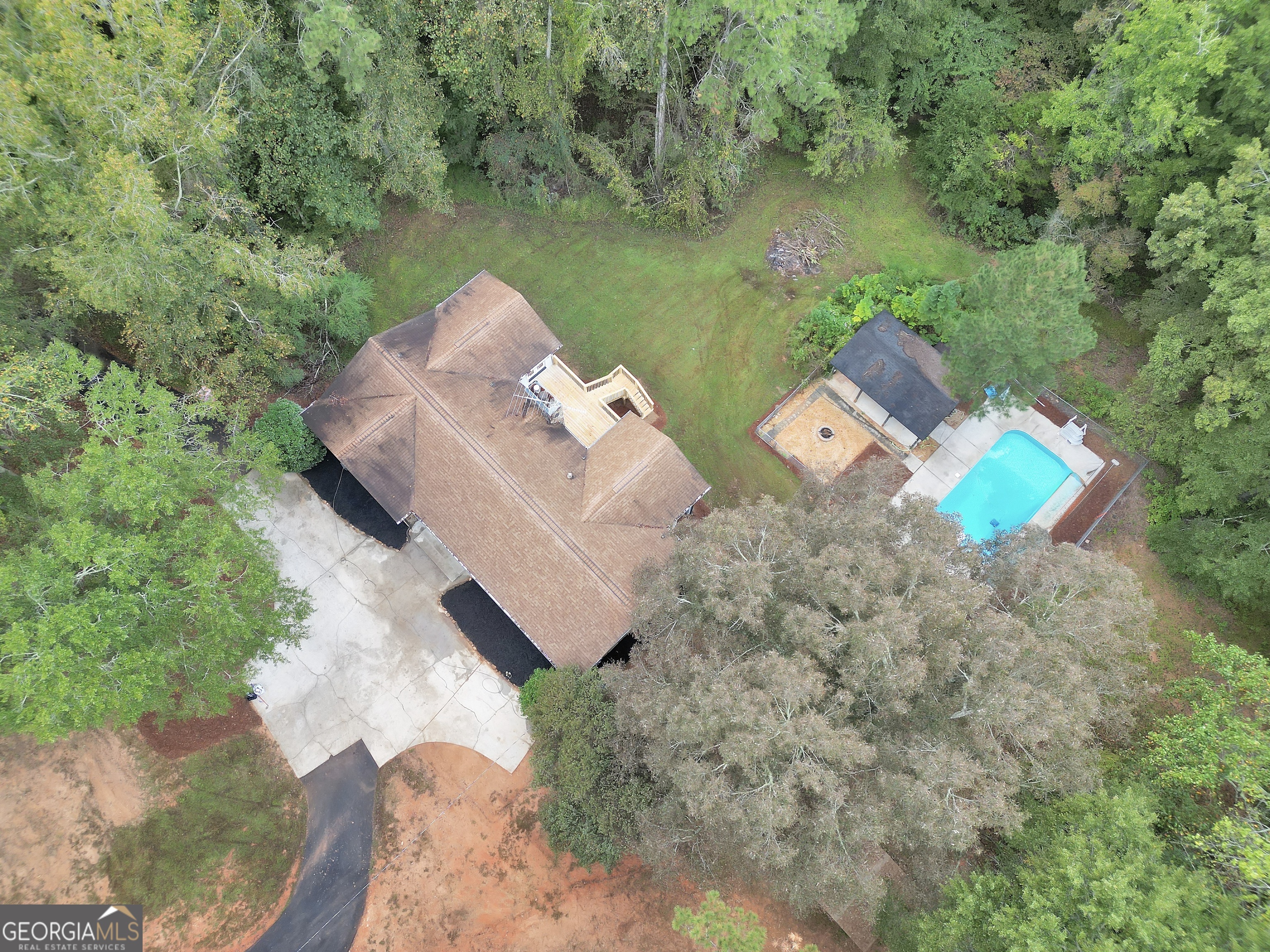 2103 Turner Church Road McDonough, GA 30252 - Photo 44 of 46 an aerial view of a house with outdoor space and lake view