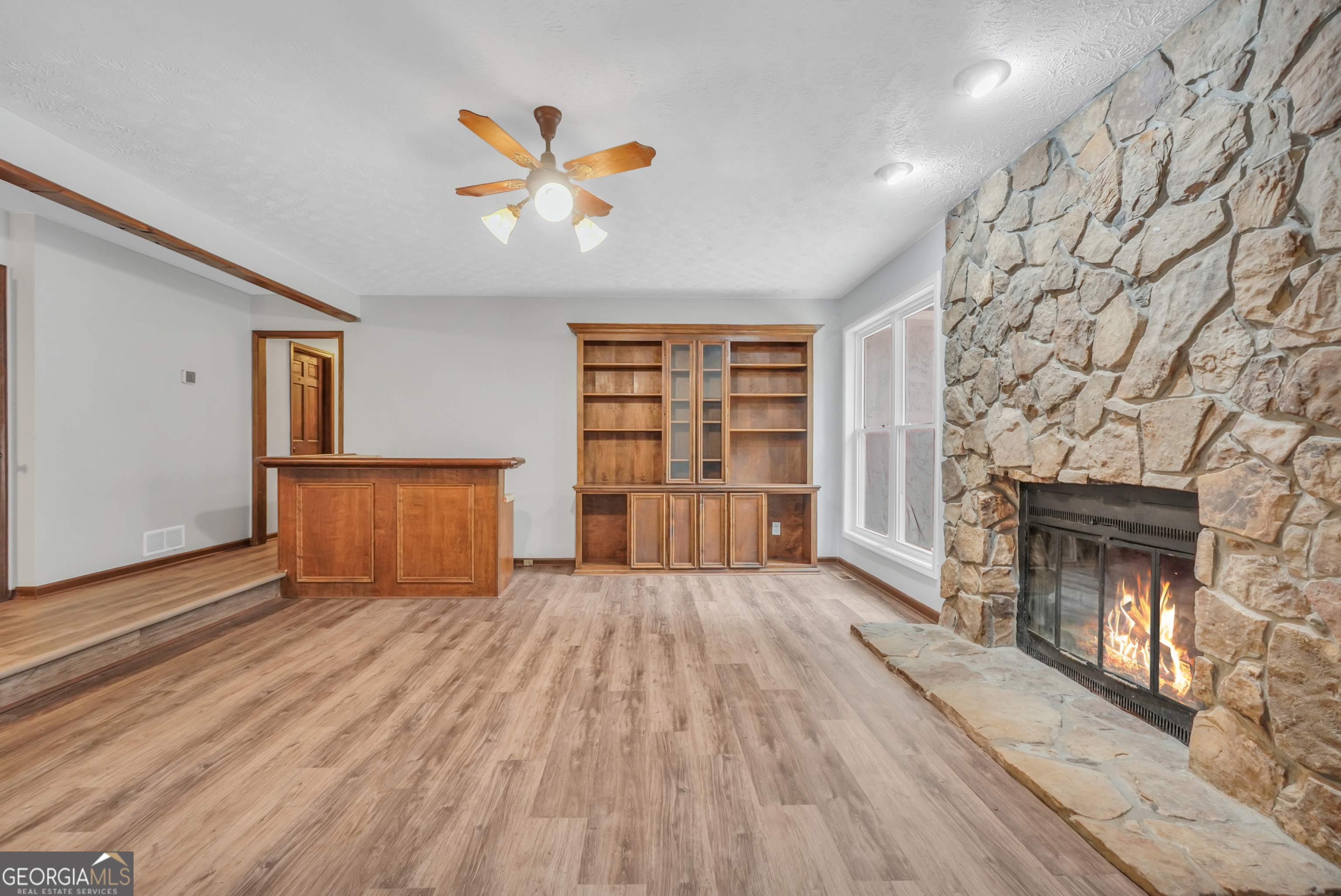 2103 Turner Church Road McDonough, GA 30252 - Photo 10 of 46 a view of an empty room with a fireplace and a window