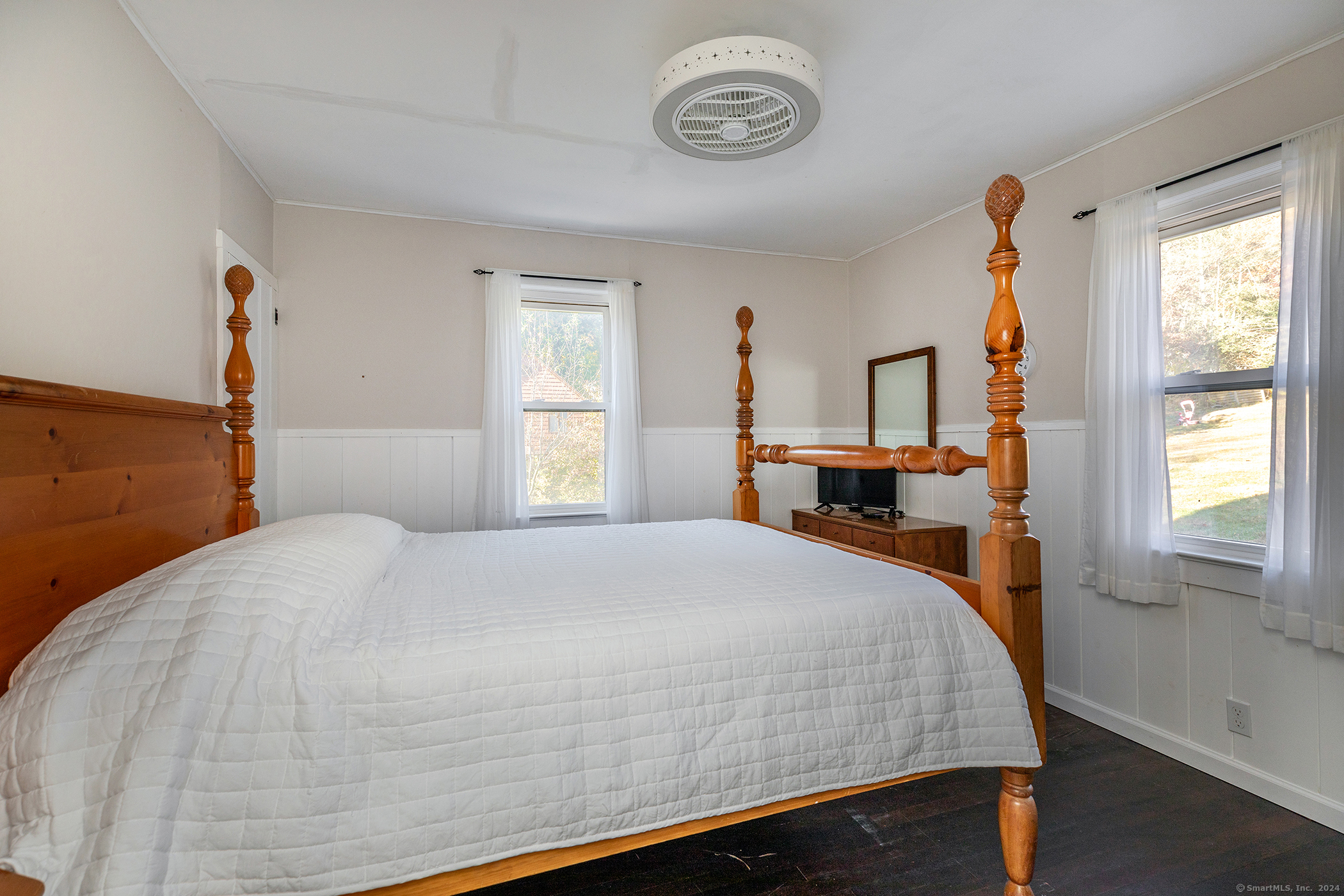 5 Windmill Road New Fairfield, CT 06812 - Photo 17 of 37 a bedroom with a bed and window