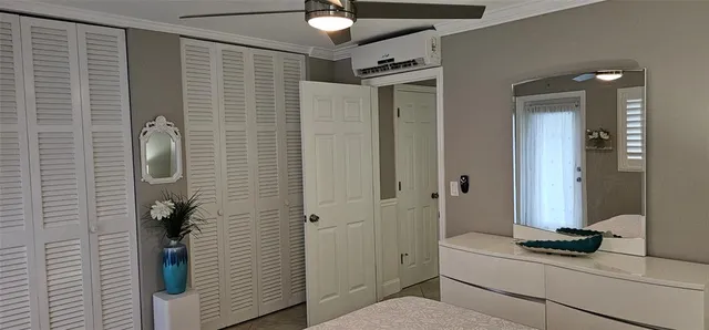 a view of a bathroom with tub and shower