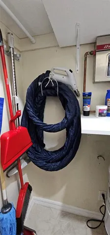 a bedroom with a bed wooden floor and a window