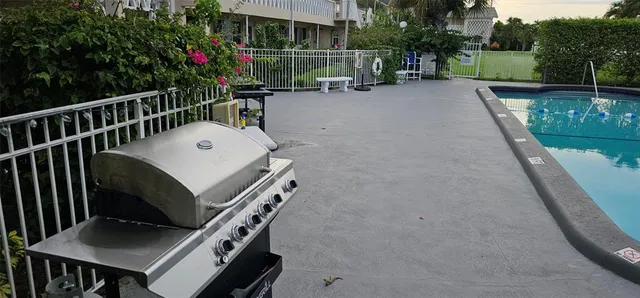 a view of a chairs and table in the terrace