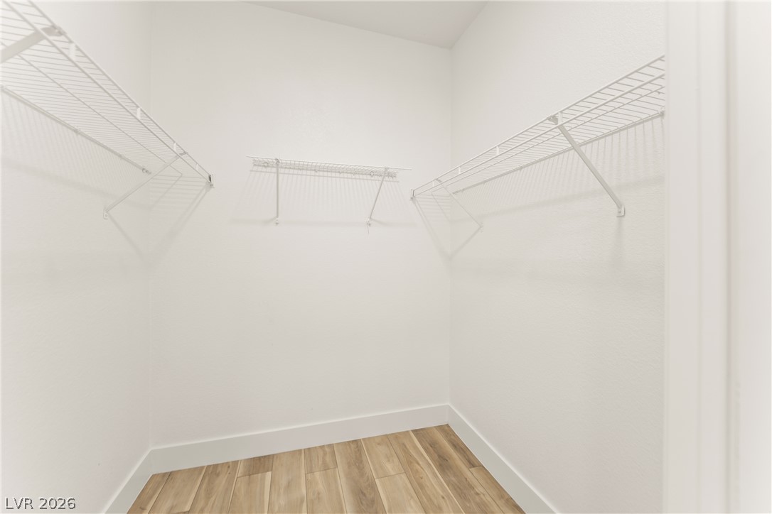 4730 East Craig Road, Unit 1053 Las Vegas, NV 89115 - Photo 15 of 32 Functional wire shelving provides ample storage within this organized walk-in closet.