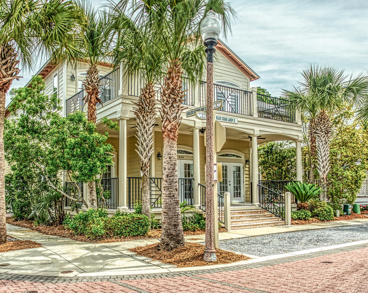 222 East Blue Crab Loop Inlet Beach, FL 32461 - Photo 3 of 50 a front view of a house with garden