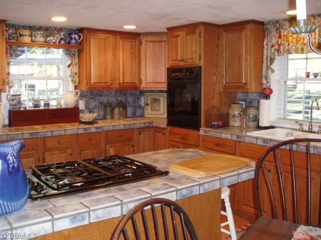 1940 Riverview Road Lexington, NC 27292 - Photo 5 of 13 Kitchen. Beautiful updated kitchen/dining combo. Lots of storage!