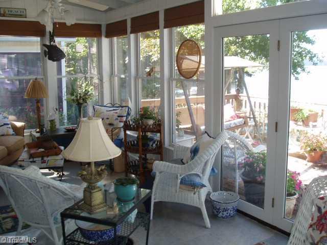 1940 Riverview Road Lexington, NC 27292 - Photo 10 of 13 Enclosed Porch. Relax in the sunroom/enclosed porch with great views of the lake. Open the large windows for fresh air and lake breezes.