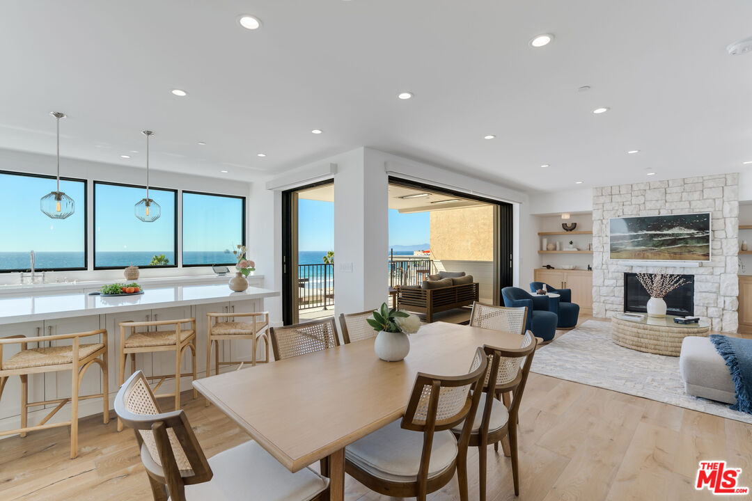 4314 Ocean Drive Manhattan Beach, CA 90266 - Photo 14 of 46 a large kitchen with a table and chairs