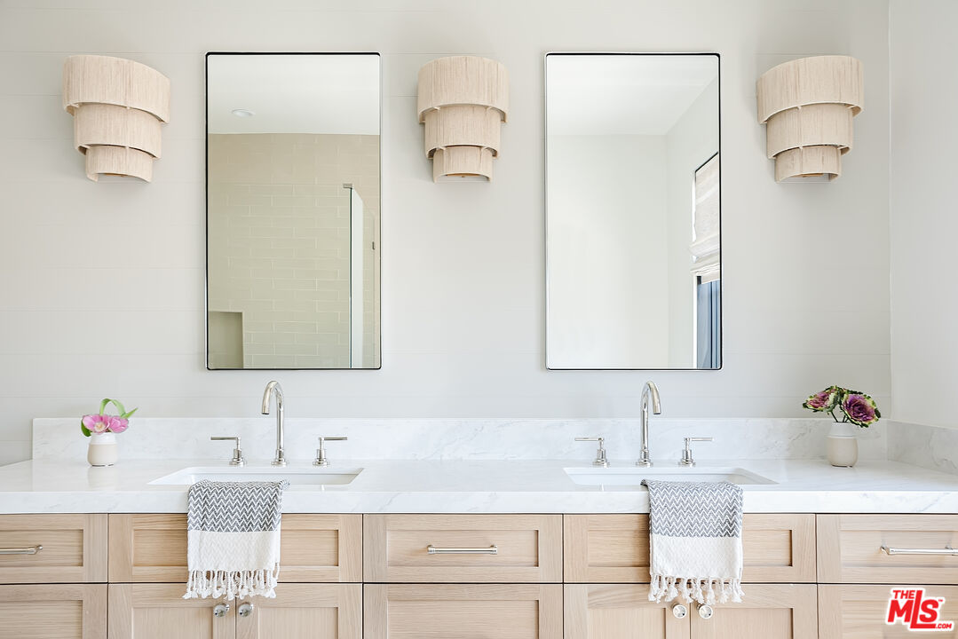 4314 Ocean Drive Manhattan Beach, CA 90266 - Photo 25 of 46 a bathroom with a sink vanity and a mirror