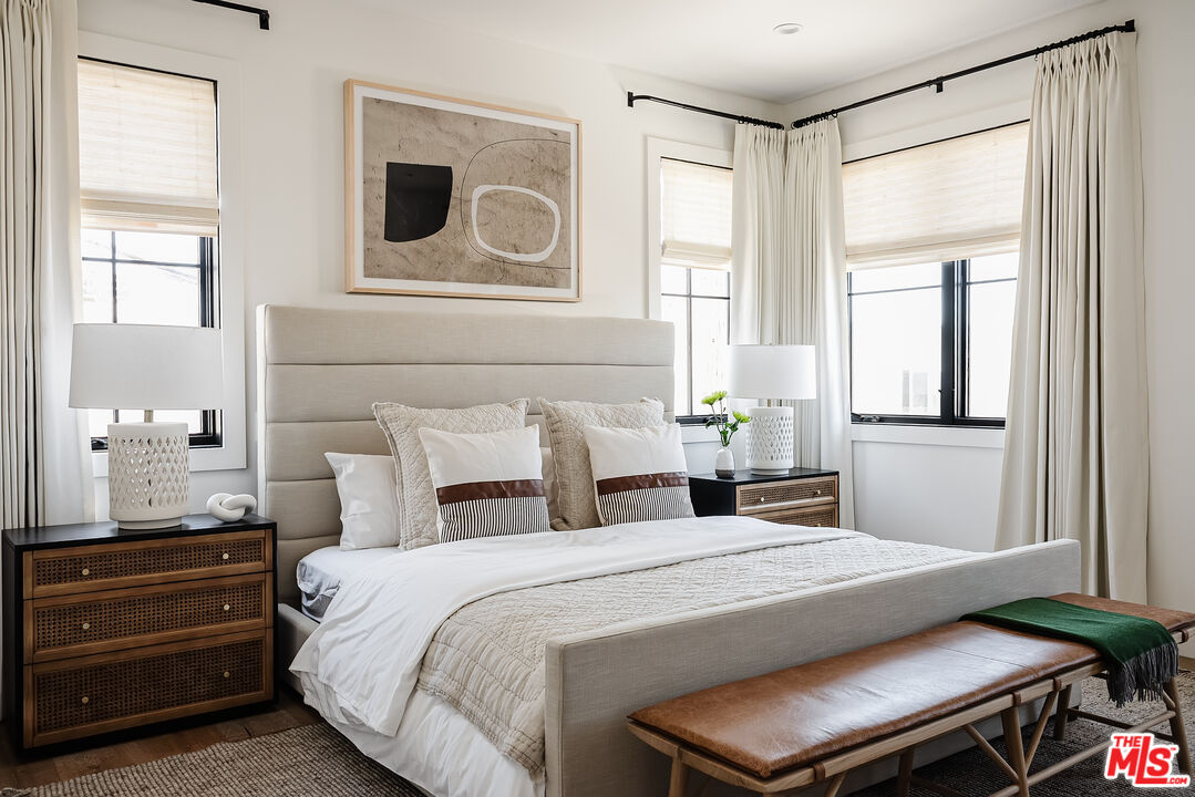 4314 Ocean Drive Manhattan Beach, CA 90266 - Photo 28 of 46 a bedroom with a bed and a window