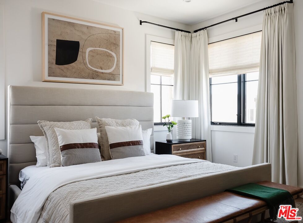 4314 Ocean Drive Manhattan Beach, CA 90266 - Photo 29 of 46 a bedroom with a bed and window