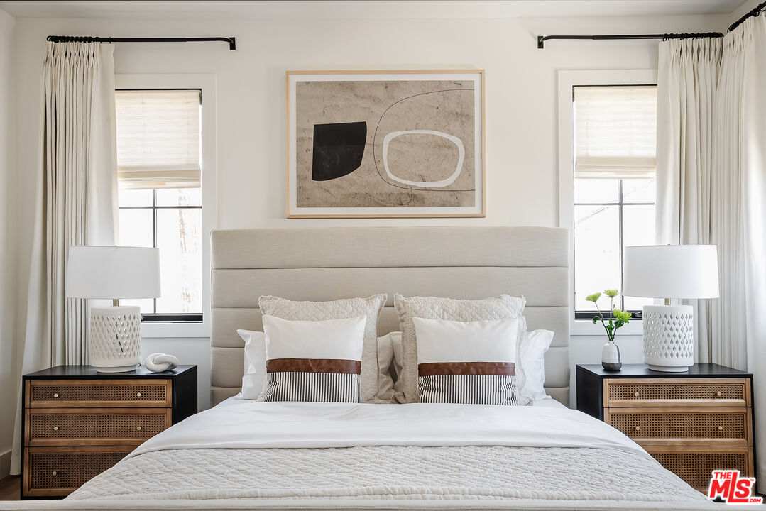 4314 Ocean Drive Manhattan Beach, CA 90266 - Photo 30 of 46 a bedroom with a bed and a potted plant