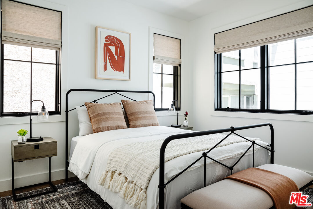 4314 Ocean Drive Manhattan Beach, CA 90266 - Photo 38 of 46 a bedroom with bed and window