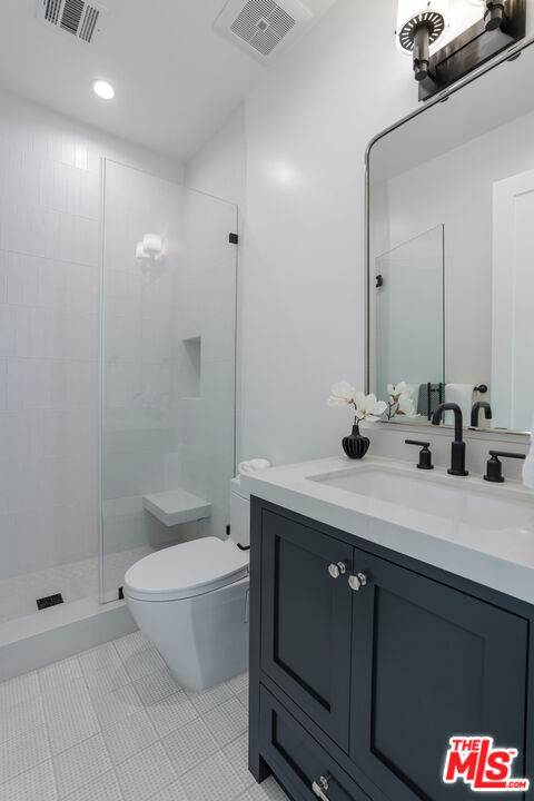 4314 Ocean Drive Manhattan Beach, CA 90266 - Photo 42 of 46 a bathroom with a sink a toilet and shower