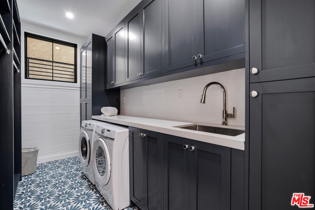 4314 Ocean Drive Manhattan Beach, CA 90266 - Photo 45 of 46 a view of cabinets with wooden floor and electronic appliances
