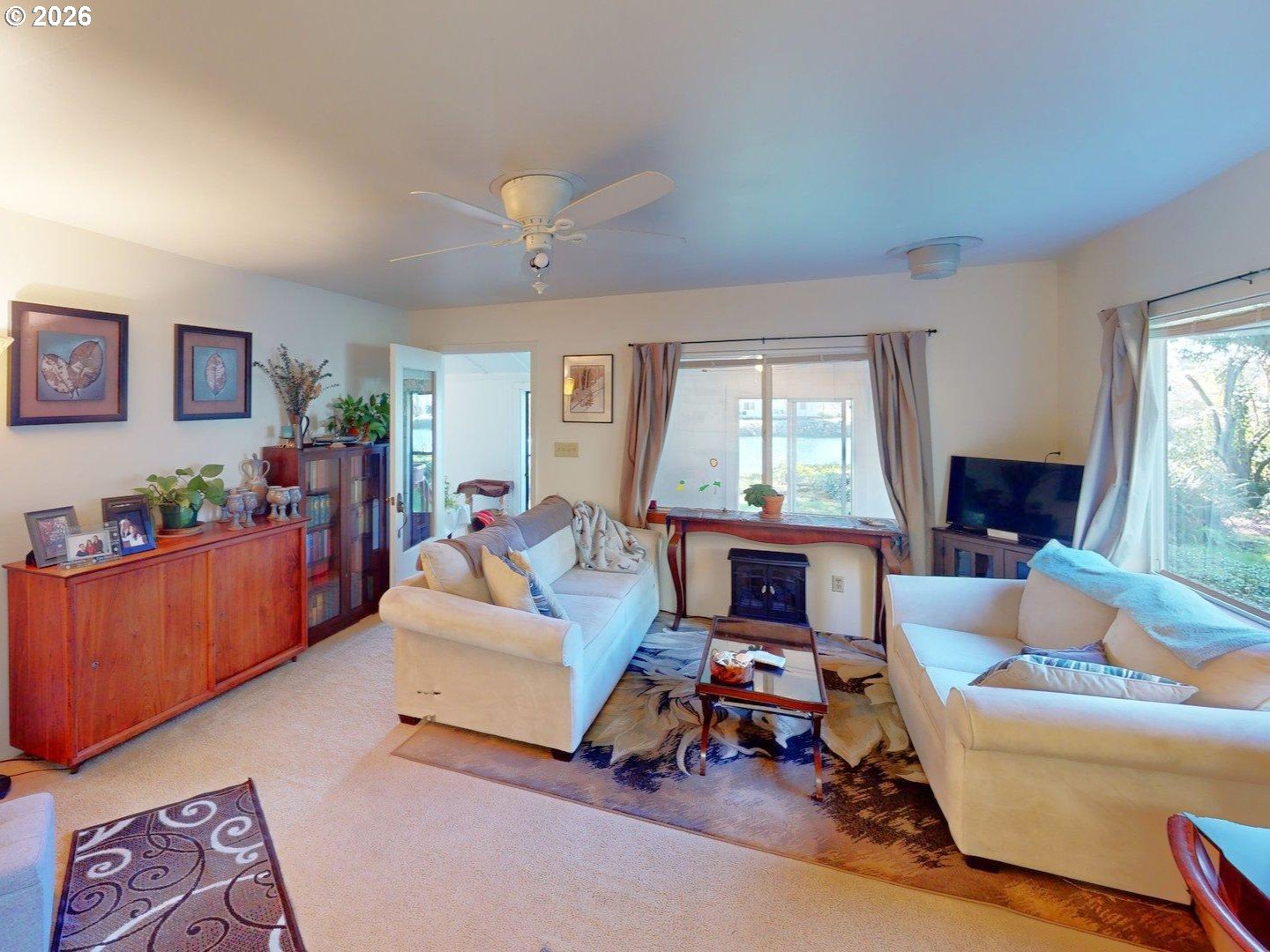 99270 Winchuck River Road Brookings, OR 97415 - Photo 20 of 41 a living room with furniture and a window