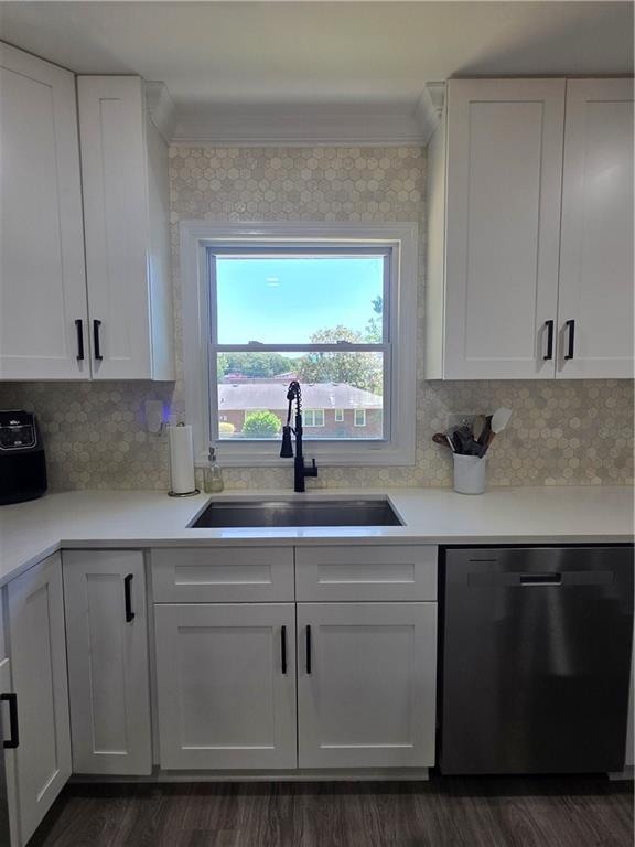 150 Sims Street Winder, GA 30680 - Photo 19 of 61 a kitchen with sink cabinets and window