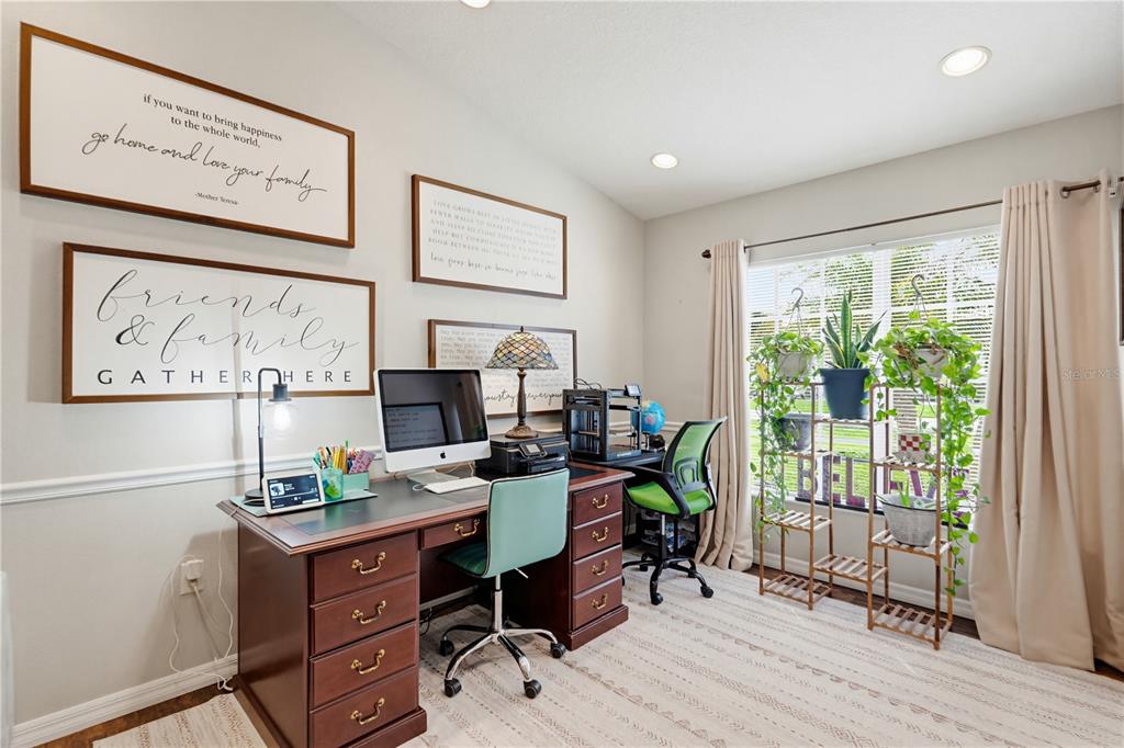 3497 Chadwick Avenue Spring Hill, FL 34609 - Photo 17 of 47 a view of a workspace with furniture and a window