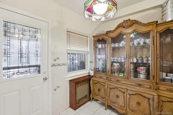 a bathroom with a sink vanity and a mirror