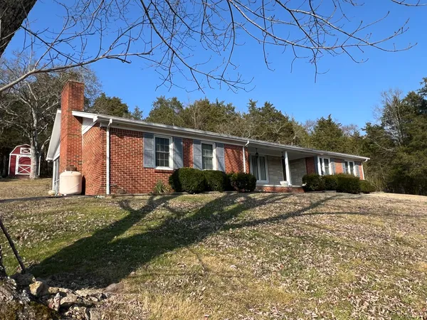 a view of a yard in front of a house