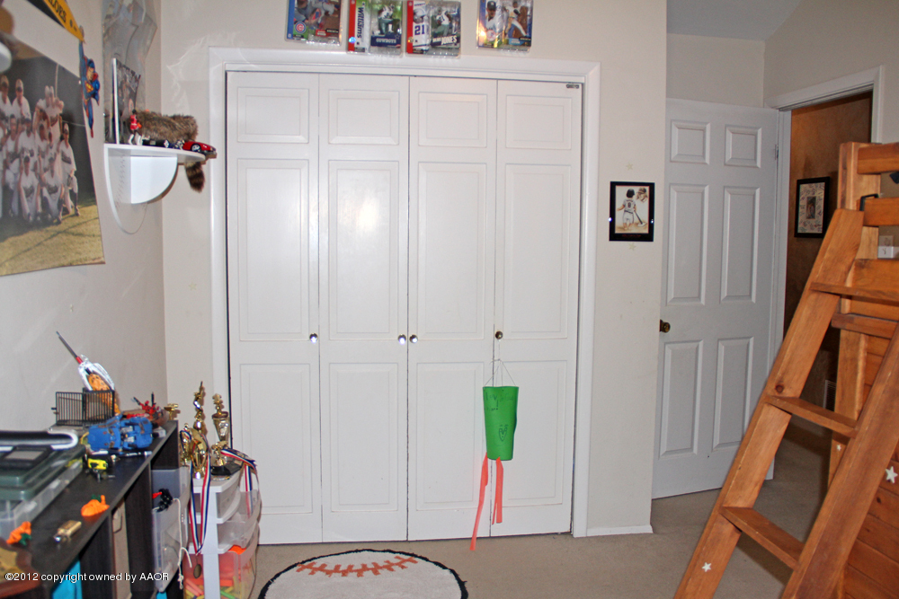 7208 Jameson Road Amarillo, TX 79106 - Photo 24 of 40 a view of an entryway with wooden floor