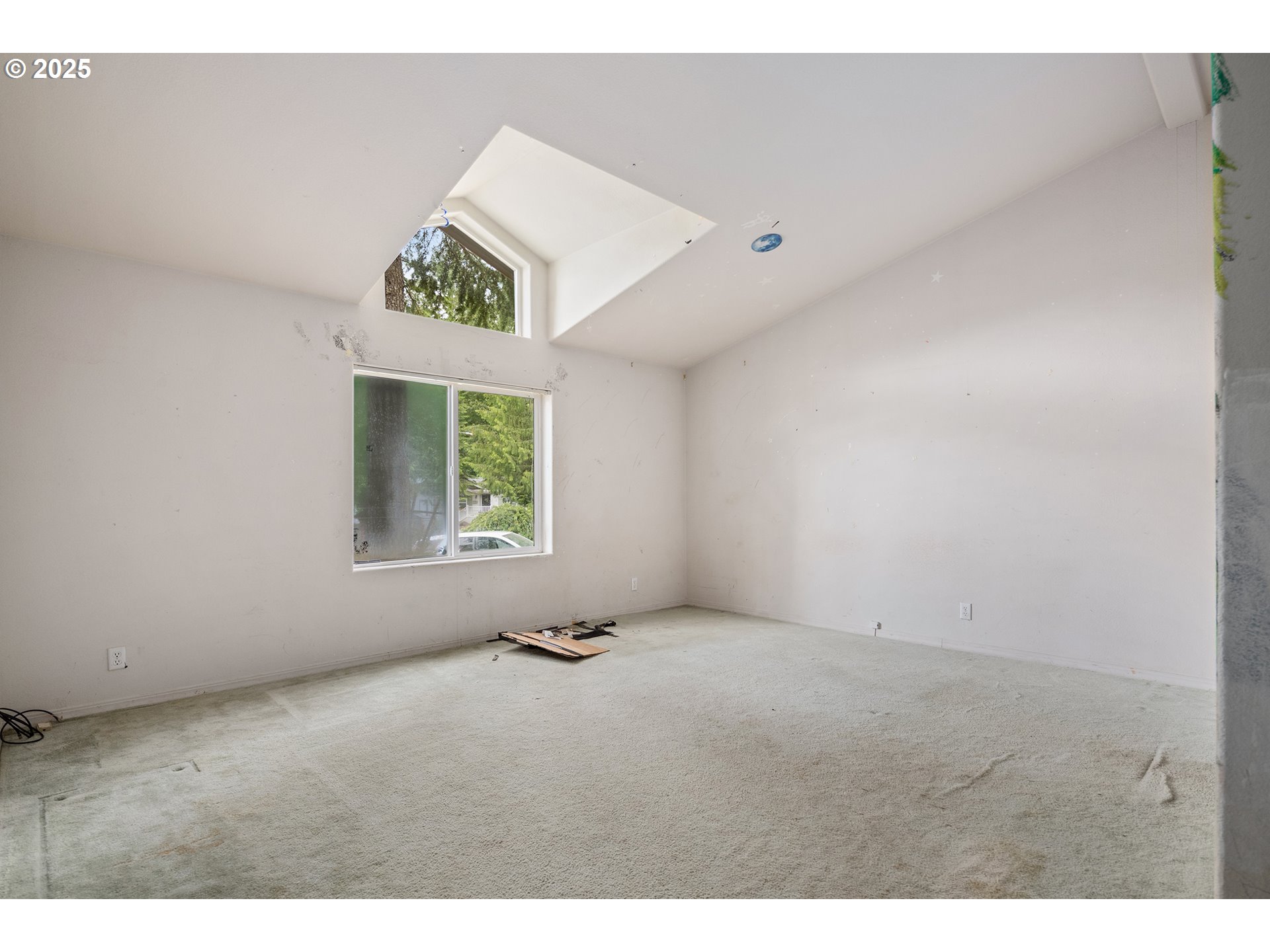 25482 East Cedar Glen Loop Welches, OR 97067 - Photo 20 of 20 a view of an empty room with a window
