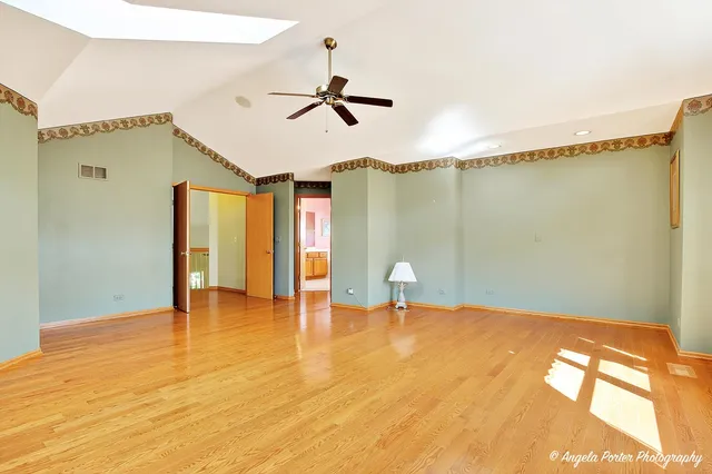 a view of a livingroom with a ceiling fan