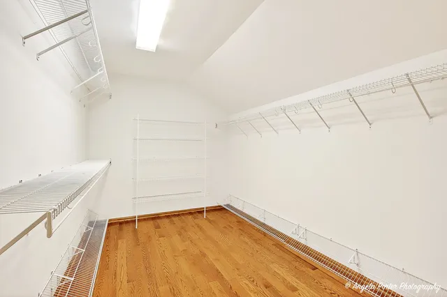 a view of a room with racks on the wall