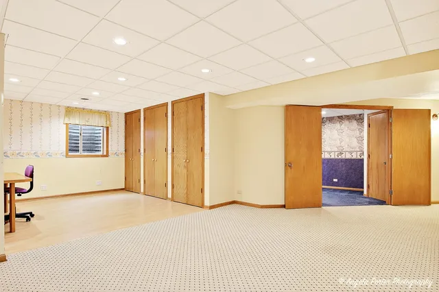 a bathroom with a sink vanity and a mirror
