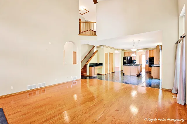 a view of an entryway with wooden floor