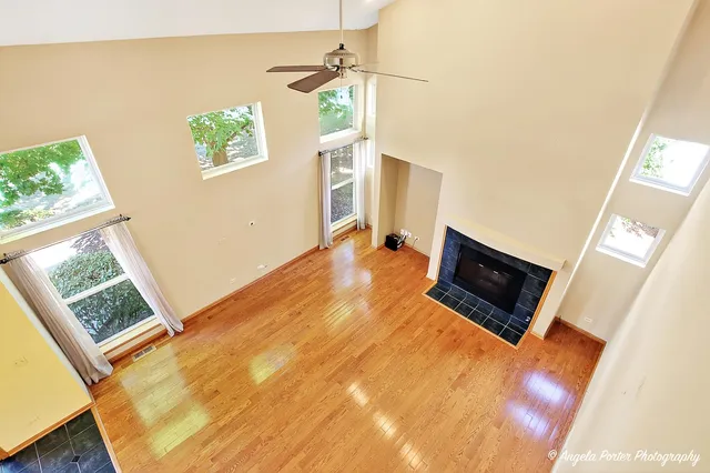 a view of an empty room with windows