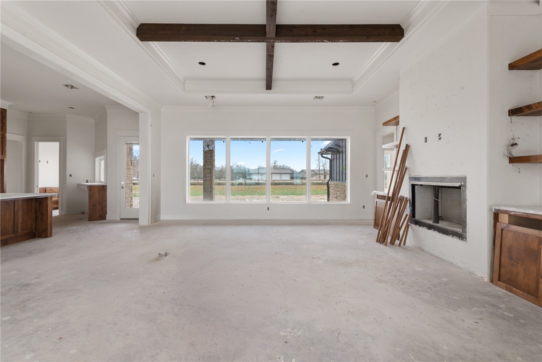 7873 Mathis Crk Drive Bryan, TX 77808 - Photo 2 of 14 a living room with furniture and a large window
