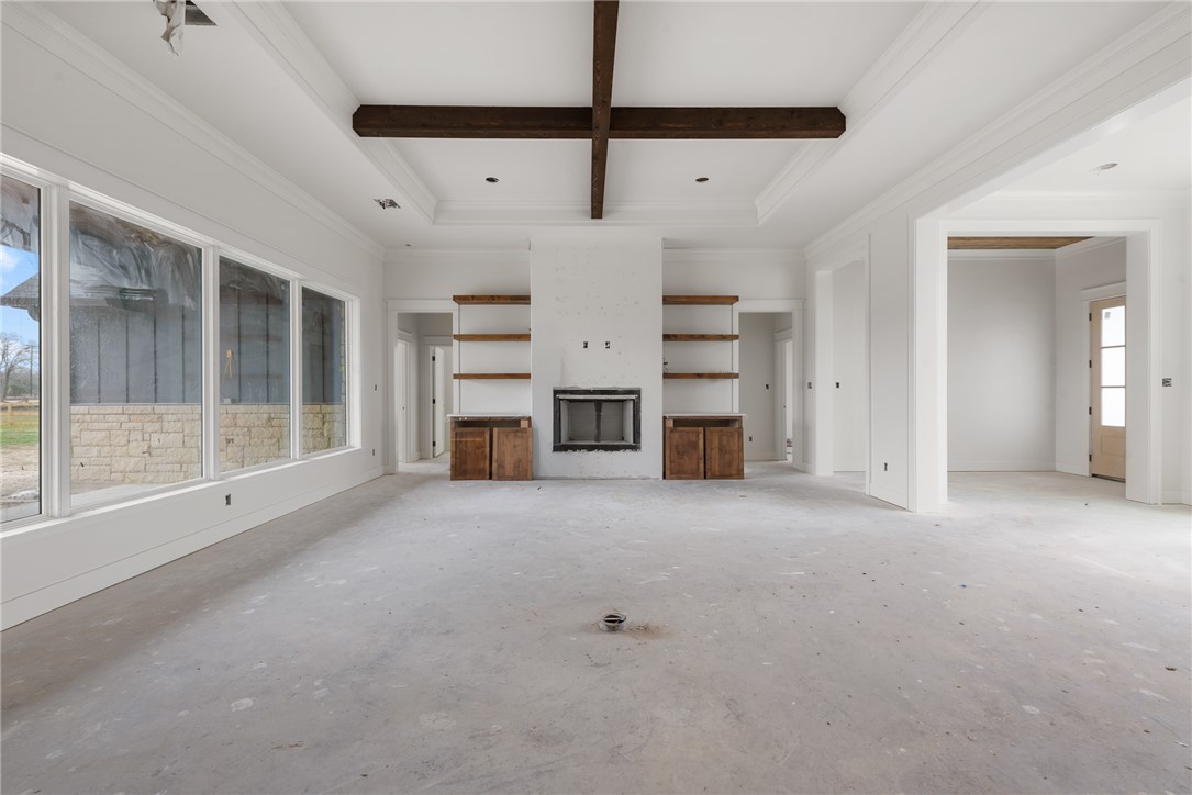 7873 Mathis Crk Drive Bryan, TX 77808 - Photo 3 of 14 a view of a livingroom with a fireplace