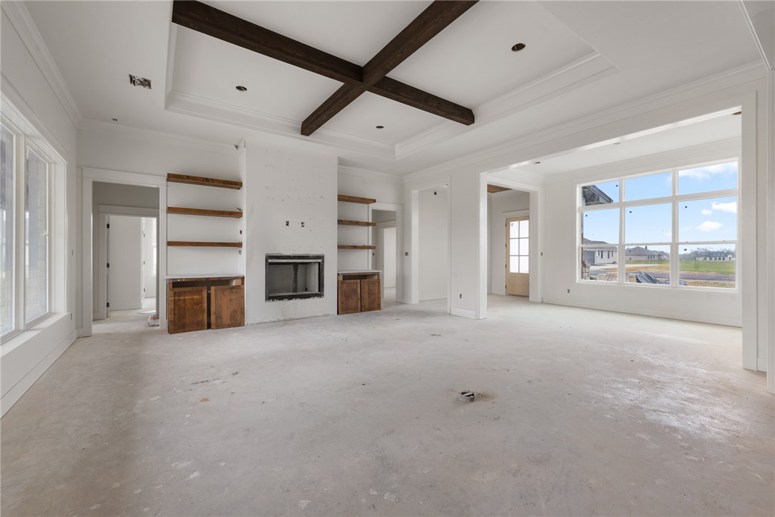 7873 Mathis Crk Drive Bryan, TX 77808 - Photo 4 of 14 a view of a livingroom with a fireplace cabinet and windows