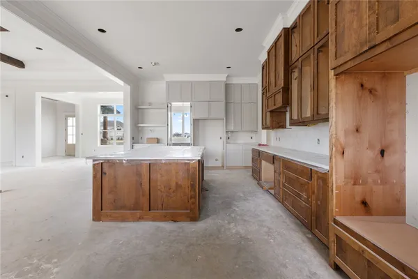 a large bathroom with a granite countertop double vanity