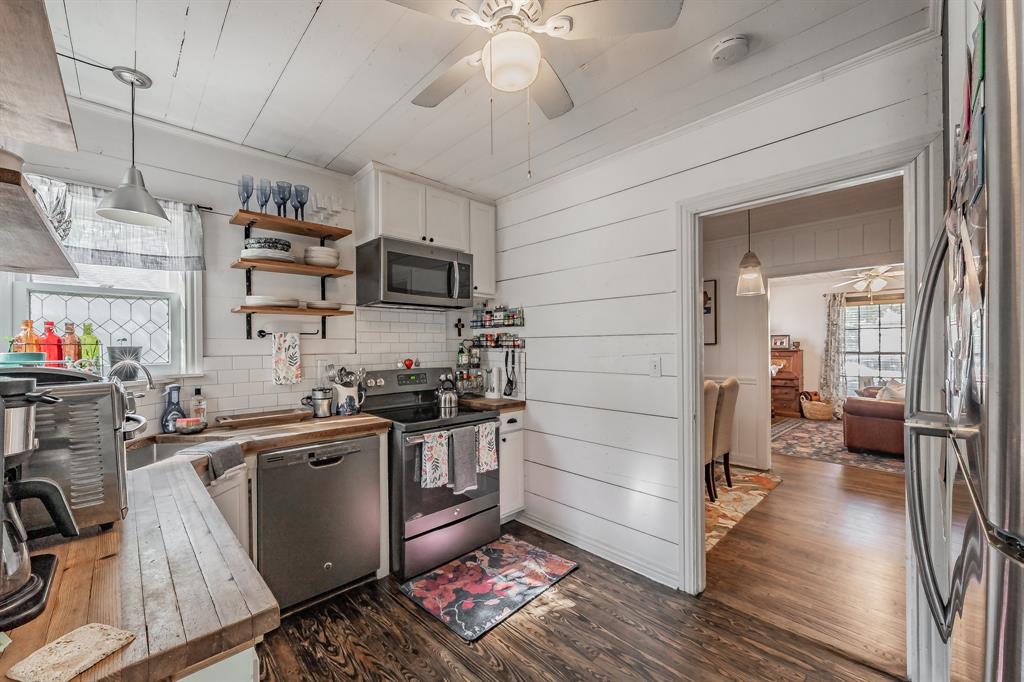 3516 Primrose Avenue Fort Worth, TX 76111 - Photo 12 of 30 a kitchen with a sink appliances and cabinets