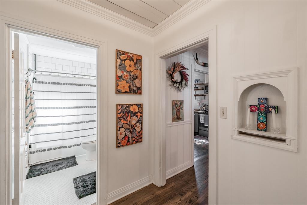 3516 Primrose Avenue Fort Worth, TX 76111 - Photo 21 of 30 a view of a hallway with wooden floor and closet