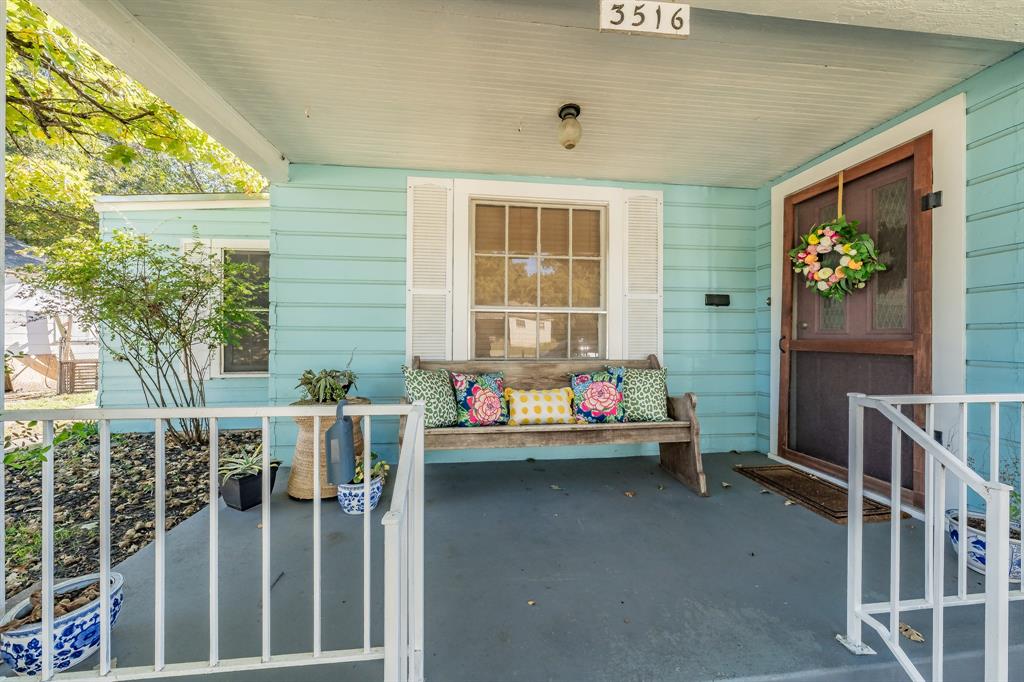 3516 Primrose Avenue Fort Worth, TX 76111 - Photo 3 of 30 a backyard of a house with wooden floor and outdoor seating