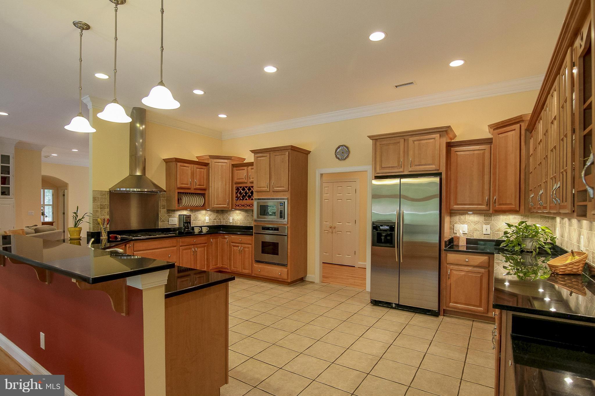 Ceramic Tile, Maple Cabinets, Dacor Appliances