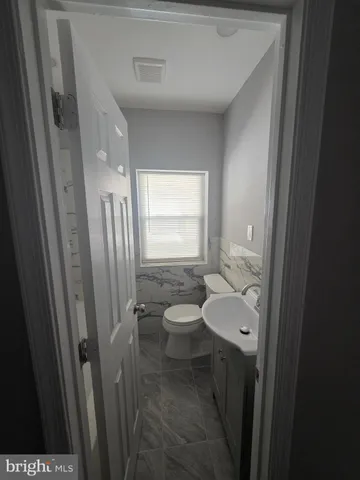 a view of room with hardwood floor