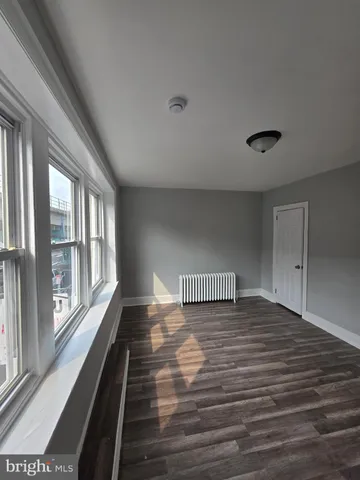 a bathroom with a toilet a sink and a bathtub