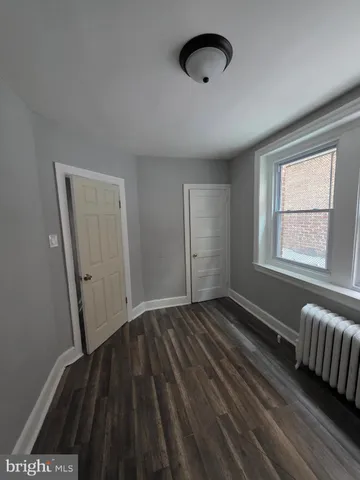 a view of a balcony with furniture