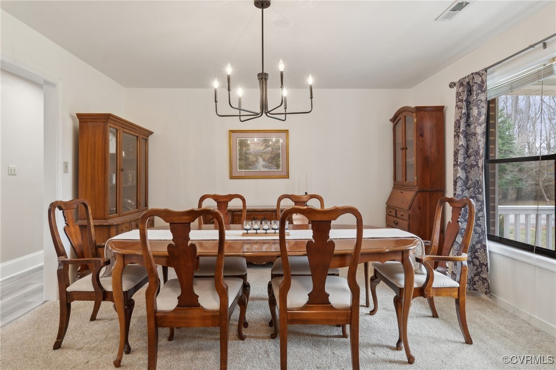 17830 Stage Road Barhamsville, VA 23011 - Photo 17 of 48 Dining room with an inviting chandelier, visible v