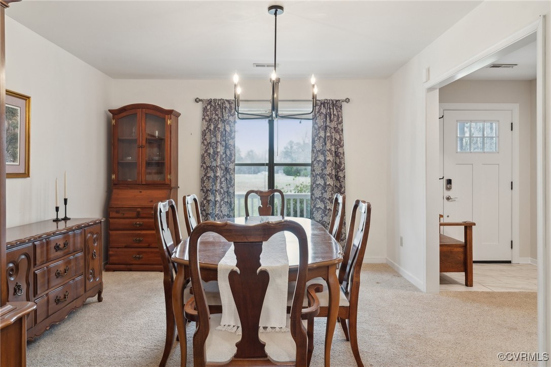 17830 Stage Road Barhamsville, VA 23011 - Photo 19 of 48 Dining area featuring light colored carpet, plenty